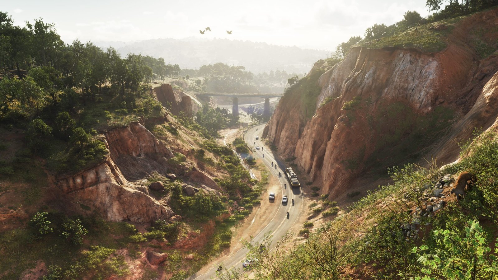 Cañón natural con carretera y aves volando en el Parque Nacional Mount Kalaga, GTA 6 vs Red Dead Redemption 2